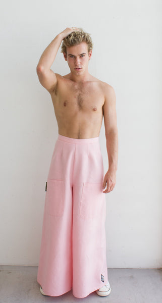 Brandon wears the Pink Wide Legged Jen Pant with no shirt showing off his gorgeous chest as the pants create a fab silhouette right to the floor.